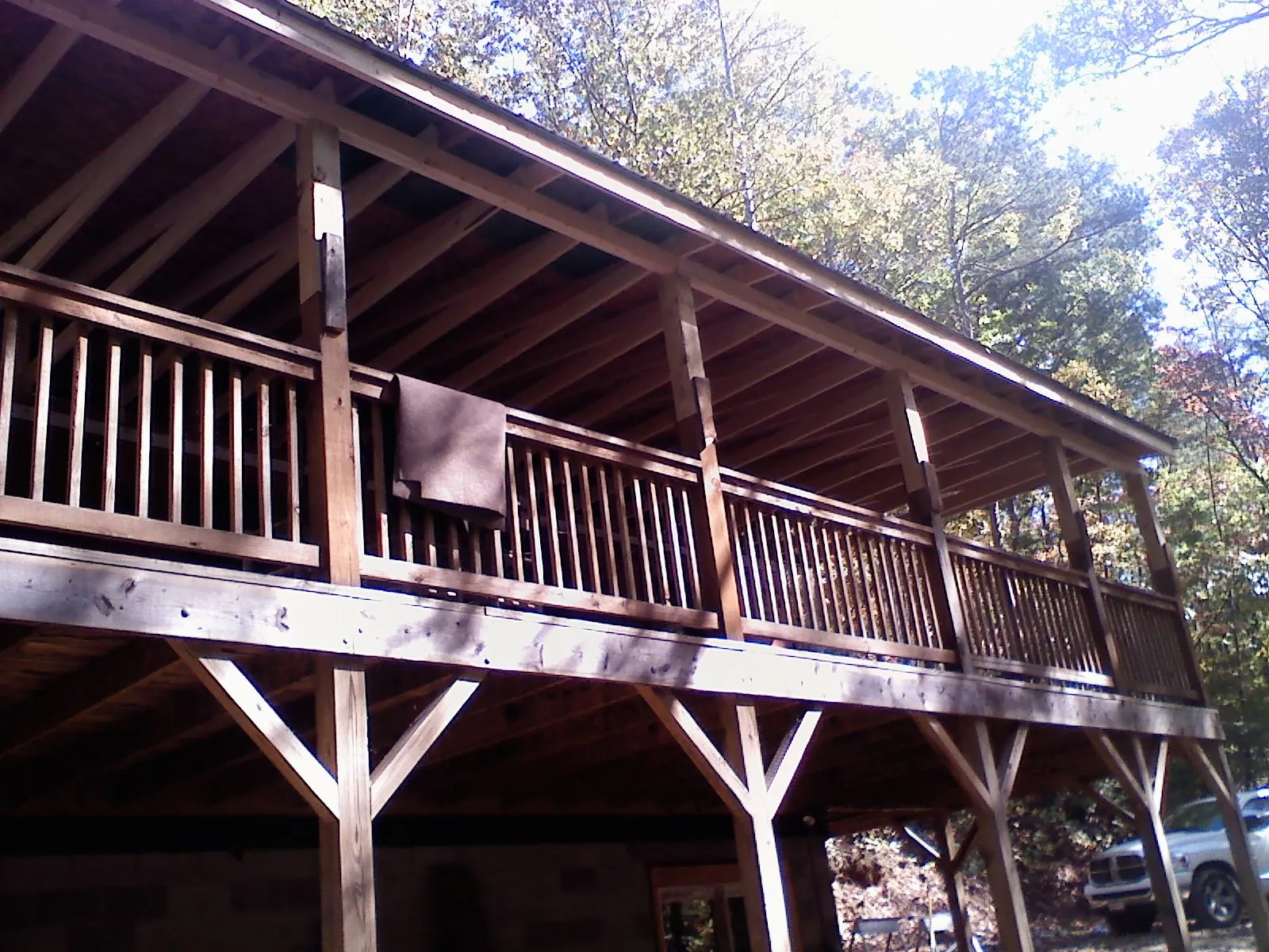 Timber framing under a new elevated porch and deck — Roof Leak Repair in Braman by Roofing Brothers
